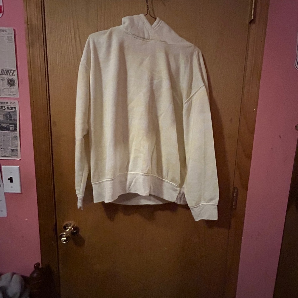 White and yellow hoodie